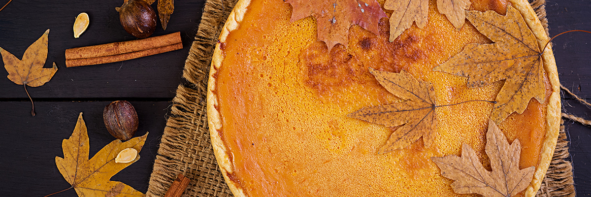 Pumpkin pie with decorative leaves