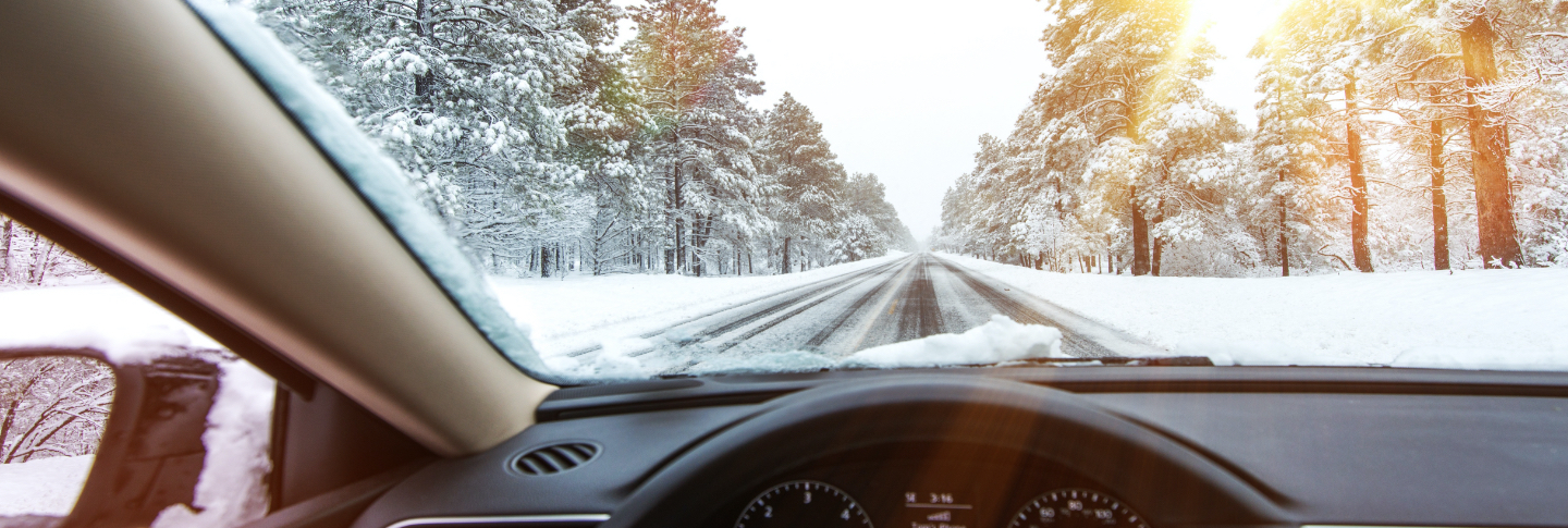 Car driving on a winter morning