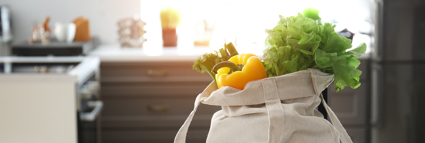 Vegetables in a bag on kitchen counter