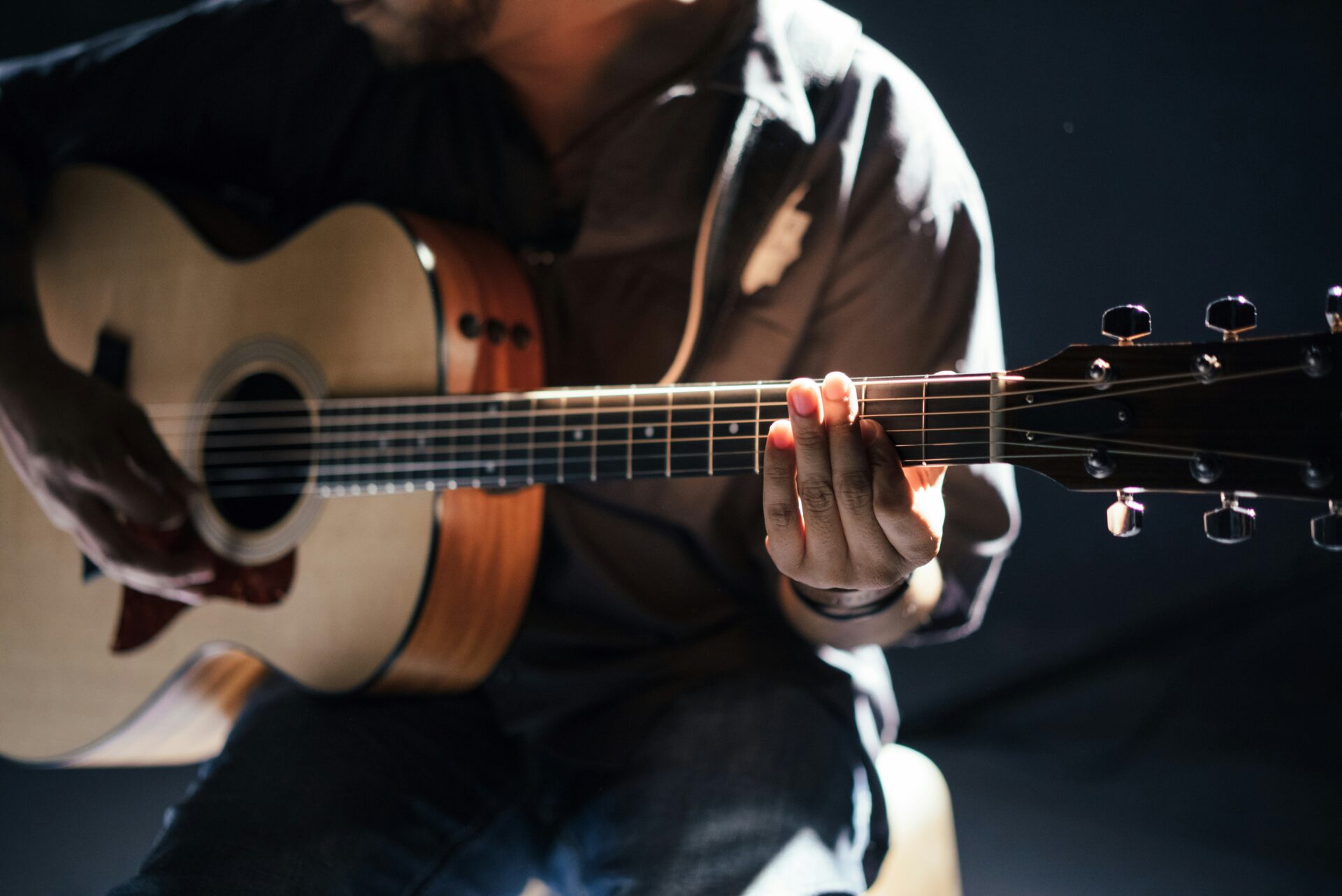 Close up of a guitarist playing live music